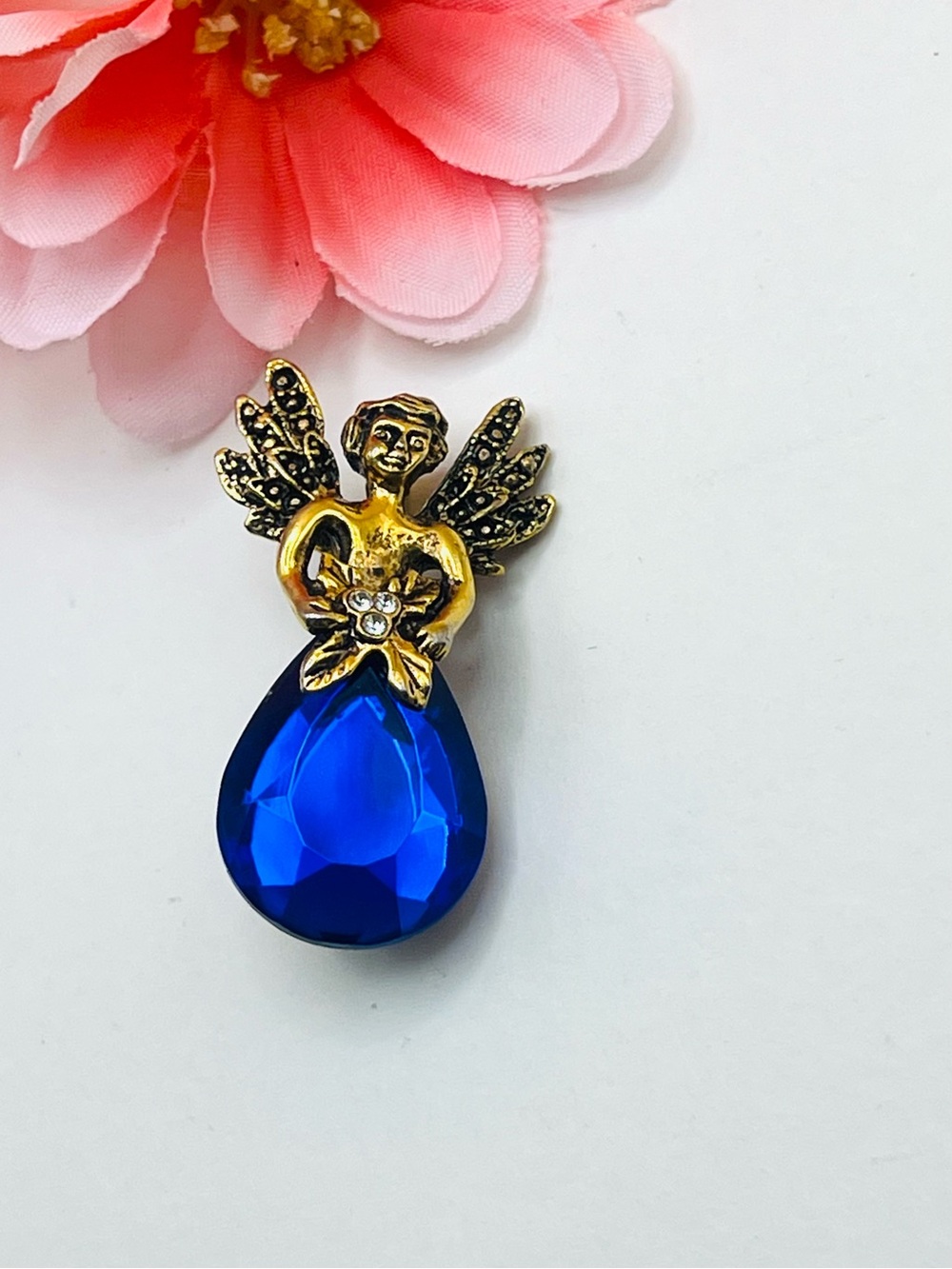 Gold Angel Brooch with Deep Blue Teardrop Crystal